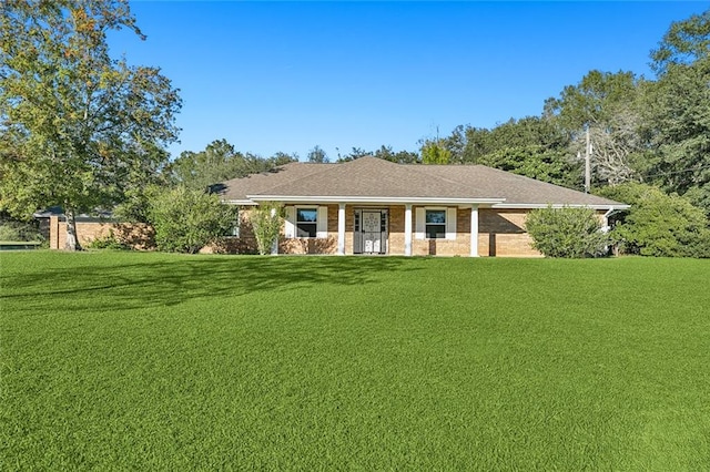 single story home with a front yard