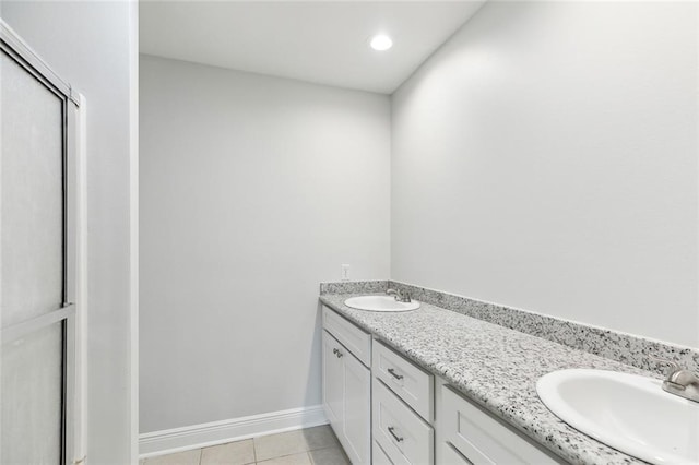 bathroom with vanity and tile patterned floors