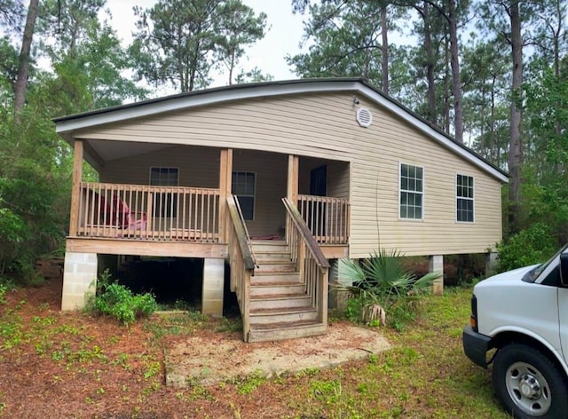 view of front of home featuring covered porch