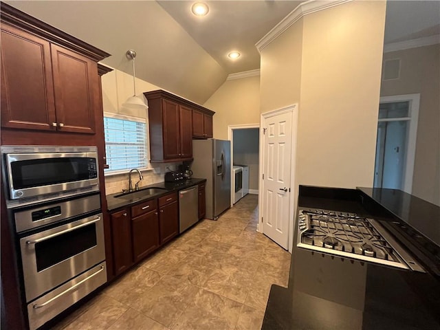 kitchen with stainless steel appliances, vaulted ceiling, crown molding, sink, and decorative light fixtures