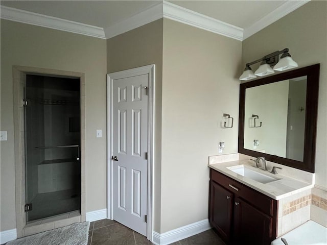 bathroom featuring ornamental molding, vanity, tile patterned floors, and a shower with shower door