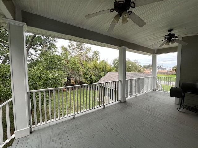 wooden deck with ceiling fan