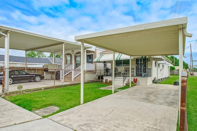 view of patio with a carport and covered porch