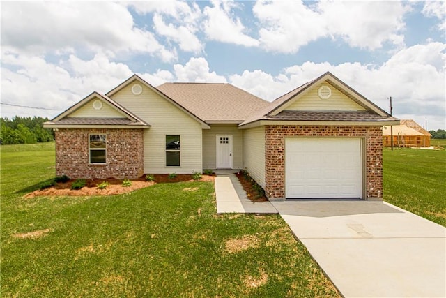 ranch-style house featuring a front lawn and a garage