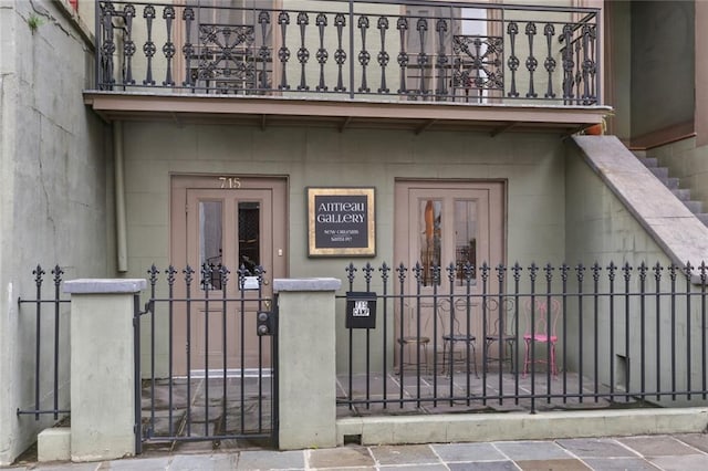 doorway to property featuring a balcony