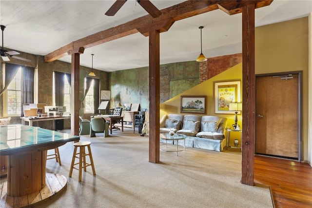 rec room featuring beamed ceiling, ceiling fan, and light hardwood / wood-style floors