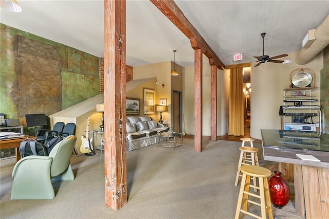 interior space featuring carpet and ceiling fan