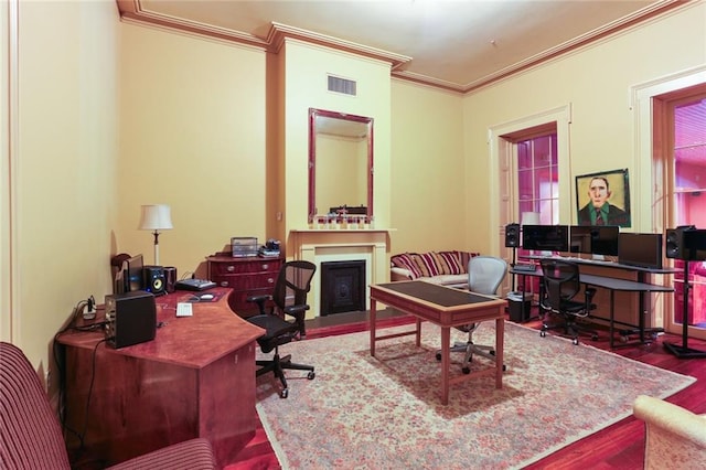 office featuring hardwood / wood-style flooring and ornamental molding