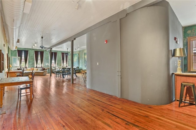 interior space with hardwood / wood-style flooring and ceiling fan