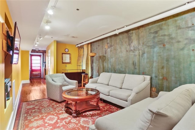 living room with hardwood / wood-style flooring