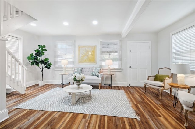 sitting room with plenty of natural light and wood-type flooring