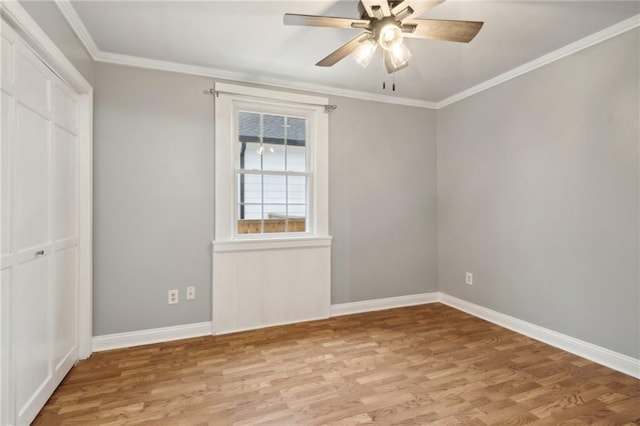 unfurnished bedroom featuring light wood-type flooring, a closet, ceiling fan, and ornamental molding