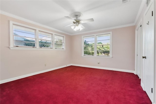 unfurnished bedroom featuring ceiling fan, carpet, and ornamental molding