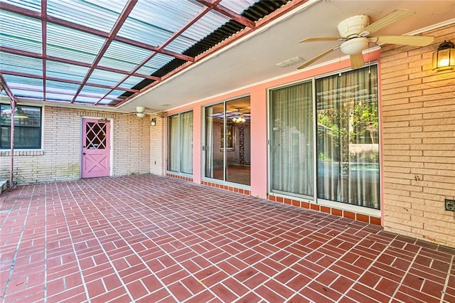 view of patio featuring ceiling fan