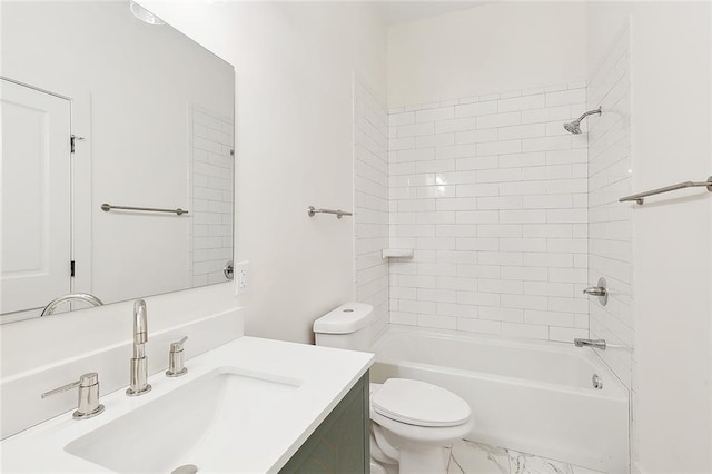 full bathroom with vanity, tiled shower / bath combo, and toilet