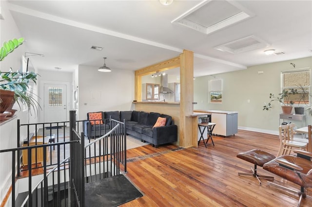 living room with hardwood / wood-style floors