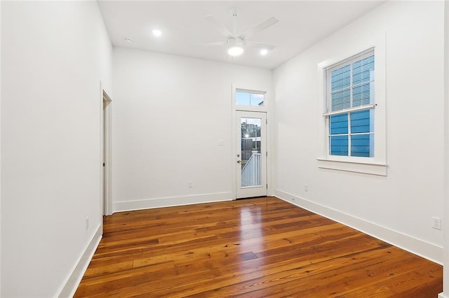 interior space with ceiling fan and hardwood / wood-style flooring