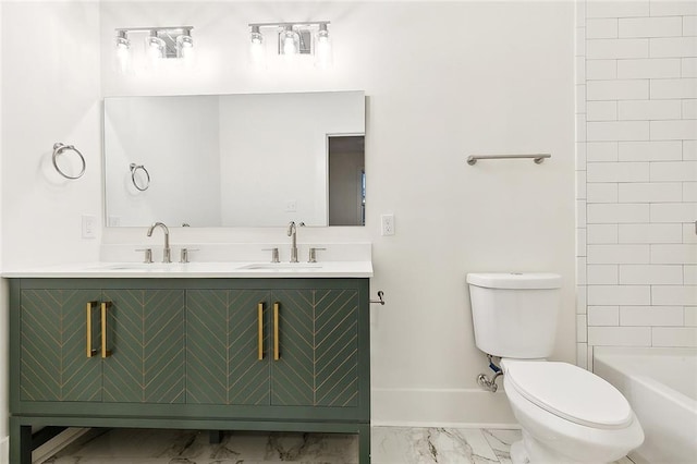 full bathroom with vanity, toilet, and washtub / shower combination