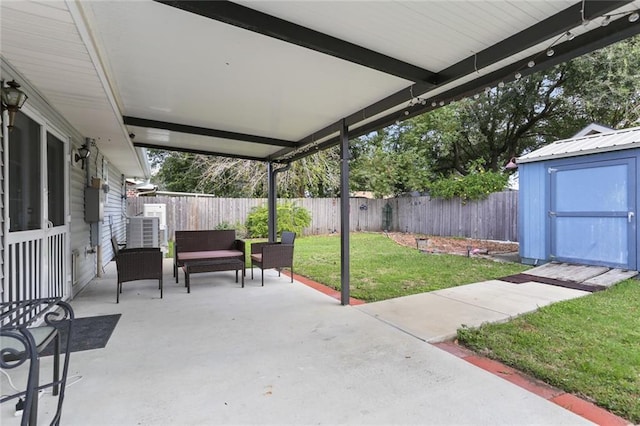 view of patio / terrace with cooling unit and a storage shed