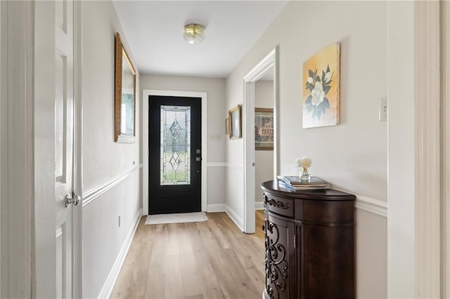 entryway with light hardwood / wood-style floors