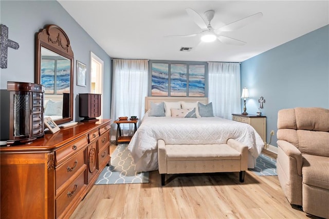 bedroom featuring light hardwood / wood-style flooring and ceiling fan