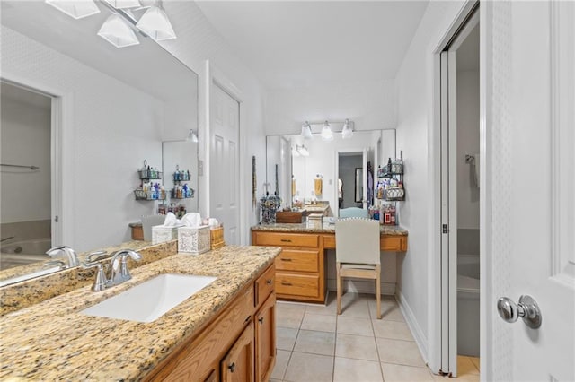 bathroom featuring tile patterned floors and vanity