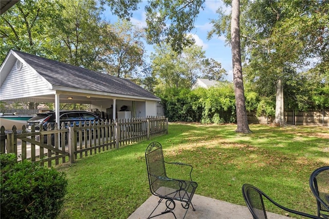 view of yard featuring a carport