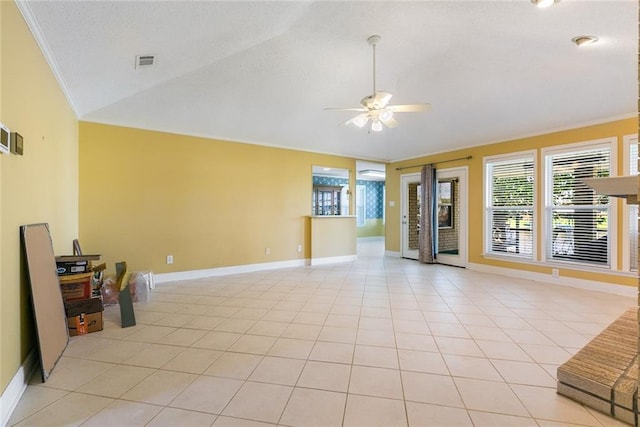 living room with crown molding, ceiling fan, light tile patterned flooring, and vaulted ceiling