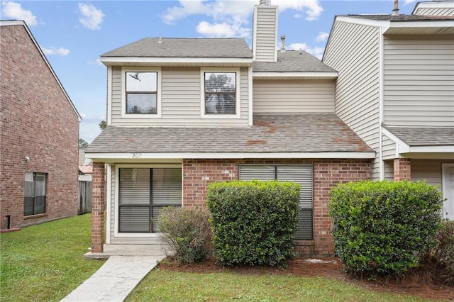 view of front of home with a front yard