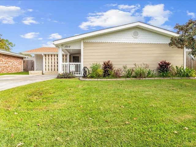 view of front of home with a front yard