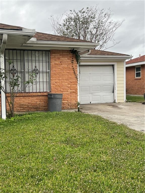 view of home's exterior featuring covered porch, a yard, and a garage