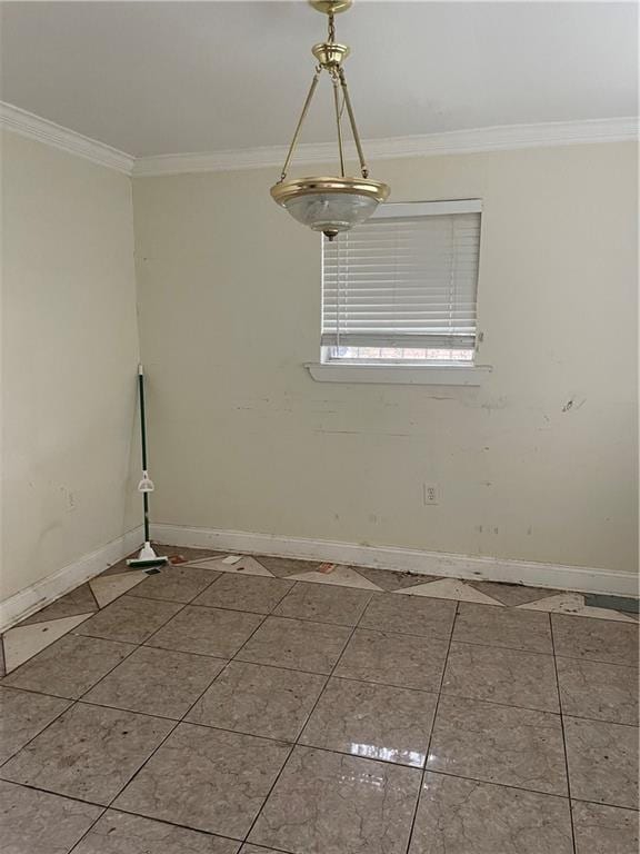 unfurnished room featuring crown molding