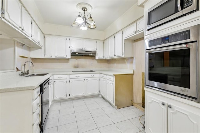 kitchen featuring white cabinetry, sink, an inviting chandelier, light tile patterned flooring, and black appliances