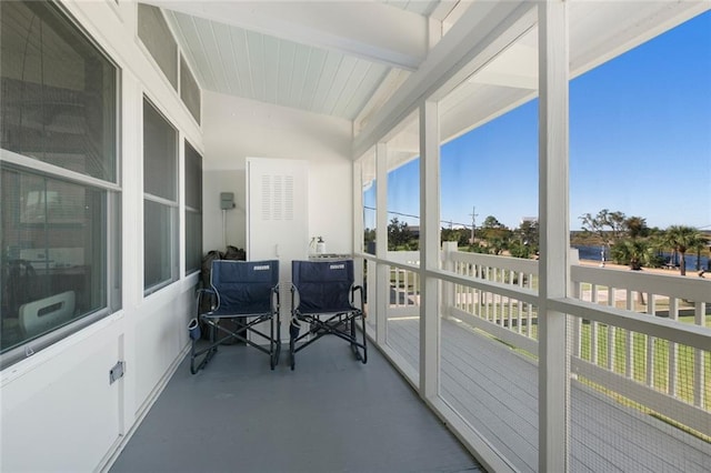 sunroom / solarium with beamed ceiling