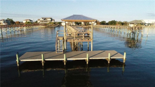 view of dock with a water view