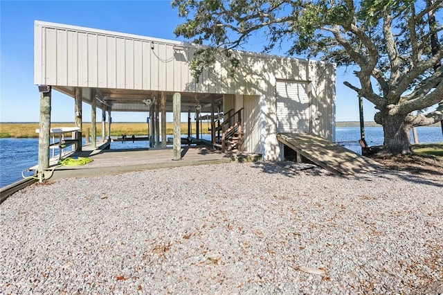 exterior space with a water view