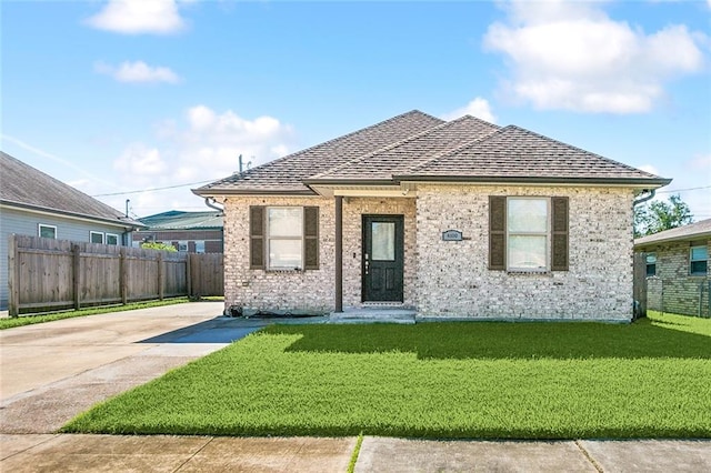 view of front of home with a front lawn