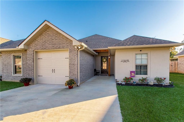 ranch-style home with a front yard and a garage