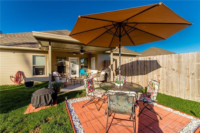 view of patio / terrace featuring ceiling fan