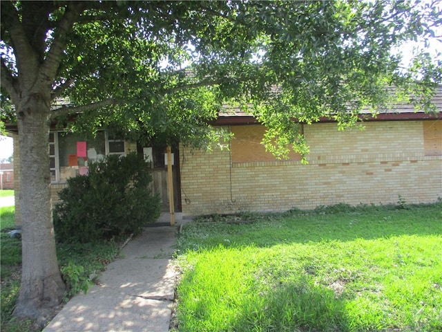 exterior space with a front yard