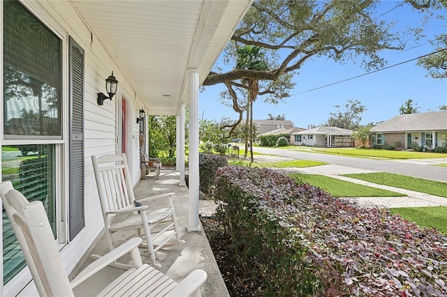 view of patio featuring a porch