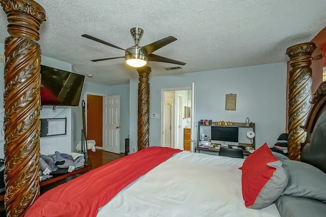 1210 Montgomery Blvd, Slidell, LA 70461 - bedroom with a textured ceiling, ceiling fan, and connected bathroom
