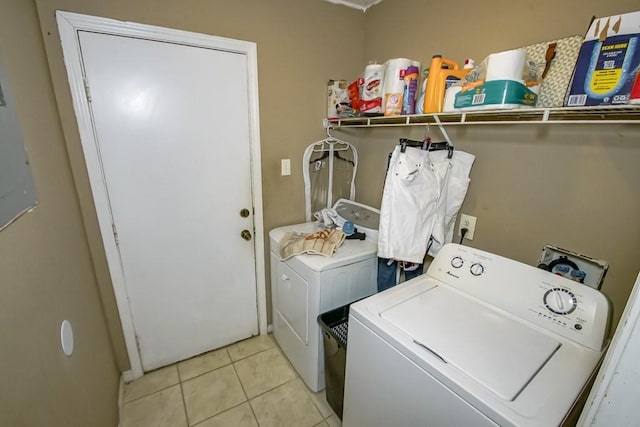 1210 Montgomery Blvd, Slidell, LA 70461 - laundry area featuring washer and clothes dryer and light tile patterned floors