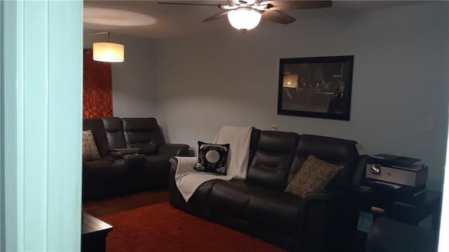 living room featuring ceiling fan