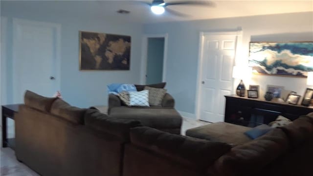 living room with ceiling fan