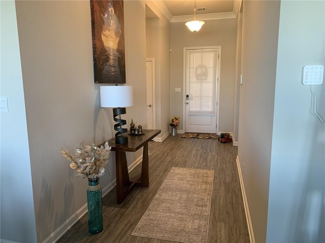 doorway to outside with dark wood-type flooring