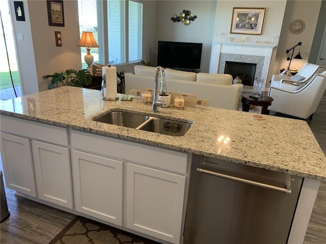 kitchen featuring dark hardwood / wood-style flooring, white cabinetry, and a healthy amount of sunlight