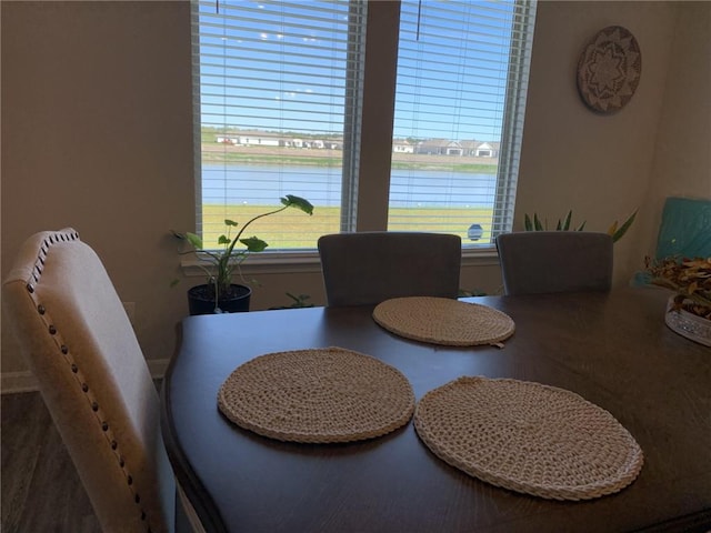 dining area with a water view