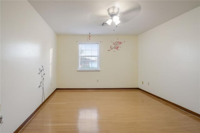 unfurnished room with light hardwood / wood-style floors and ceiling fan