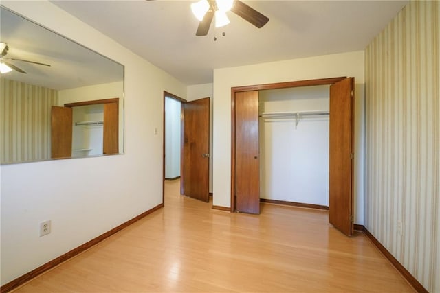 unfurnished bedroom featuring a closet, ceiling fan, and light hardwood / wood-style flooring